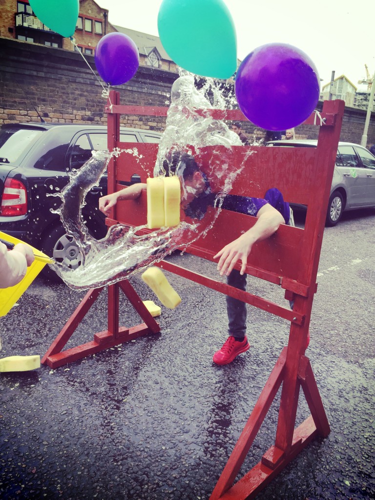 Our lettings negotiator Bradley bravely took to the stocks and let an audience throw ice-cold water soaked sponges at him for a small donation 