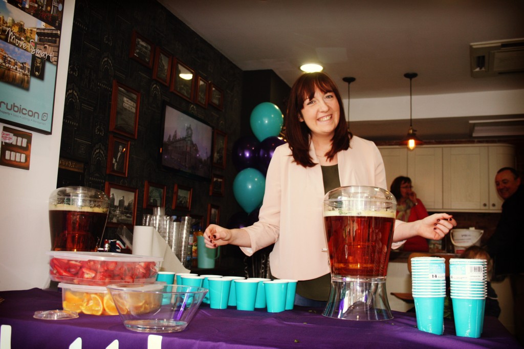 Our admin girl Vicky serving up fresh fruit & Pimms